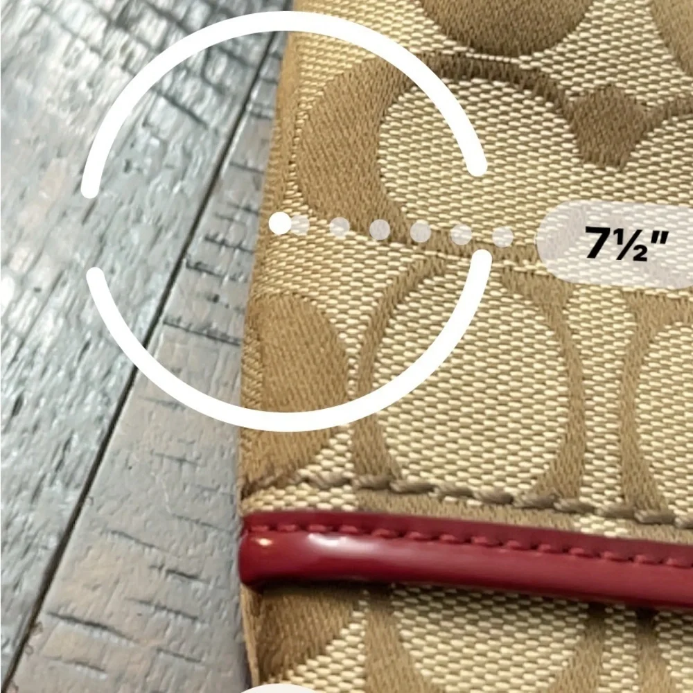 Coach wristlet with pink details! In good condition!